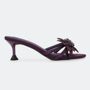 Heels adorned with a crystal-studded flower